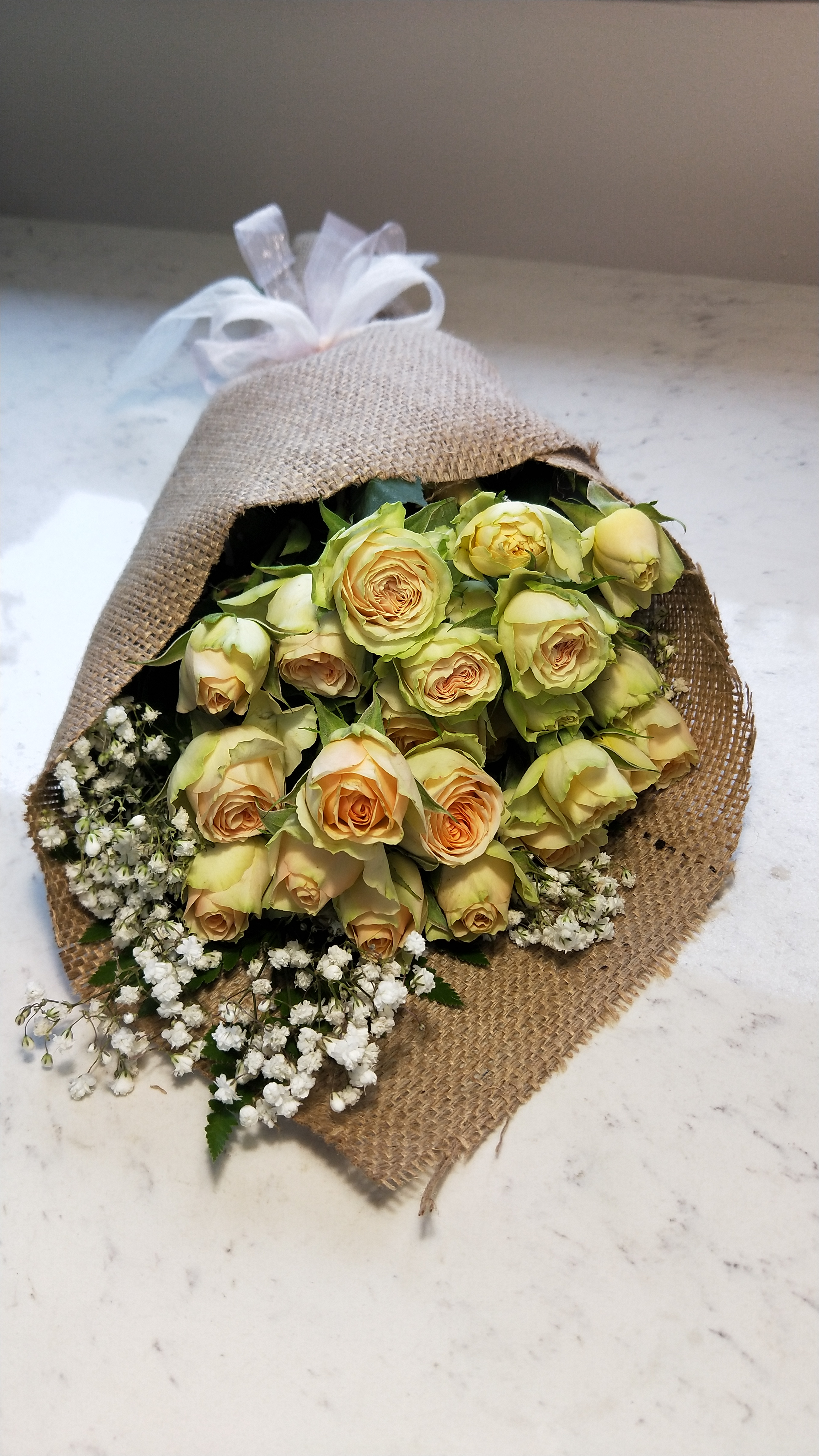 Cream spray roses bouquet makes ideal gift for many occasions.